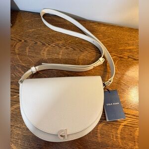 COLE HAAN Evie Ivory Saddle Bag, NWT